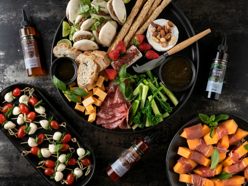 Charcuterie board drizzled with Safari glazes