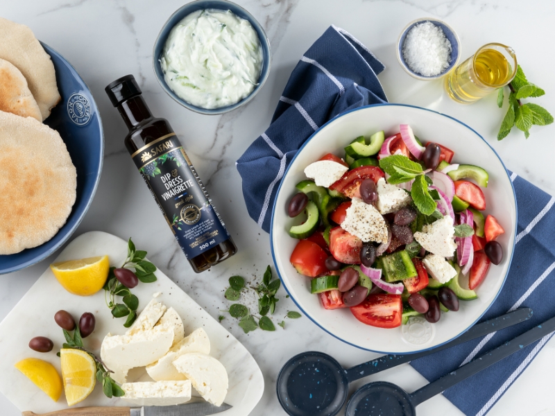 Greek salad with tomatoes, cucumber, red onion and olives
