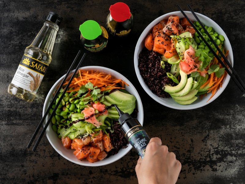 Poke bowl with salmon, vegetables and rice